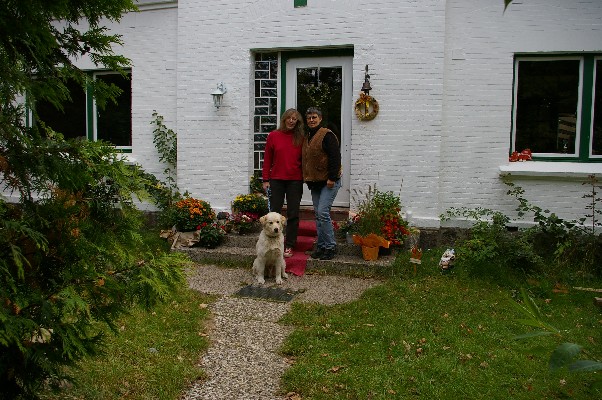 We are in front of our house